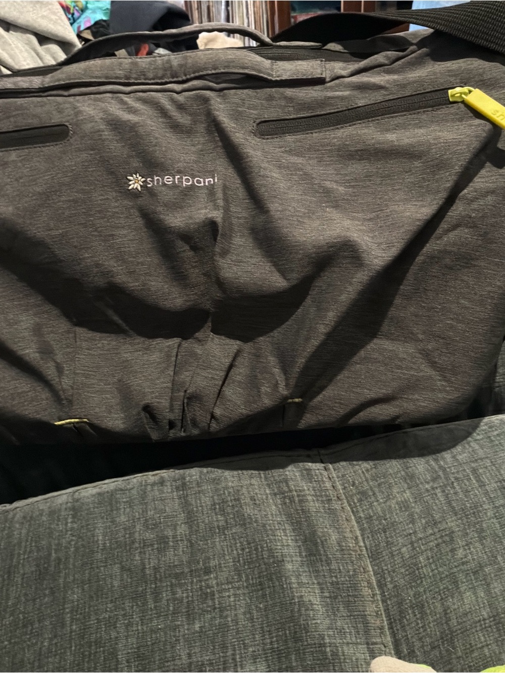 Sherpani black duffel with lime zipper accents